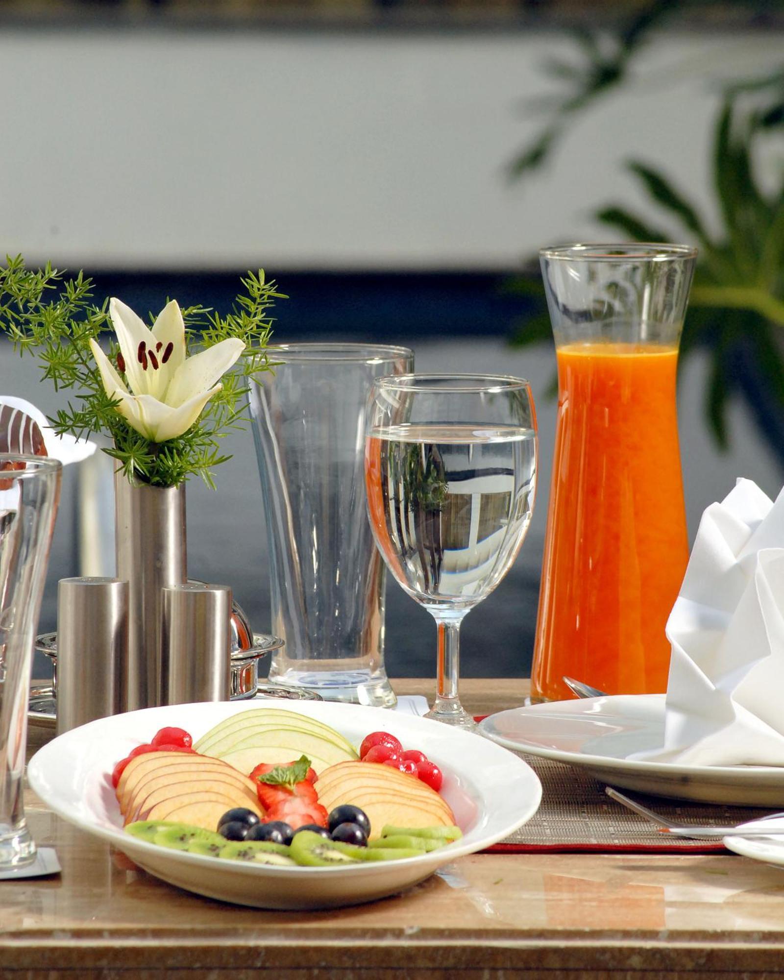 Fortune Jp Palace, Mysore - Member Itc Hotels' Group Extérieur photo A glass of orange juice